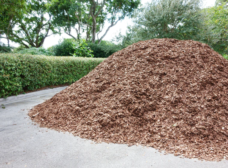 mulching pile in the middle of a driveway